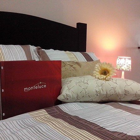 Monteluce Condominium Apartment Silang Chambre photo